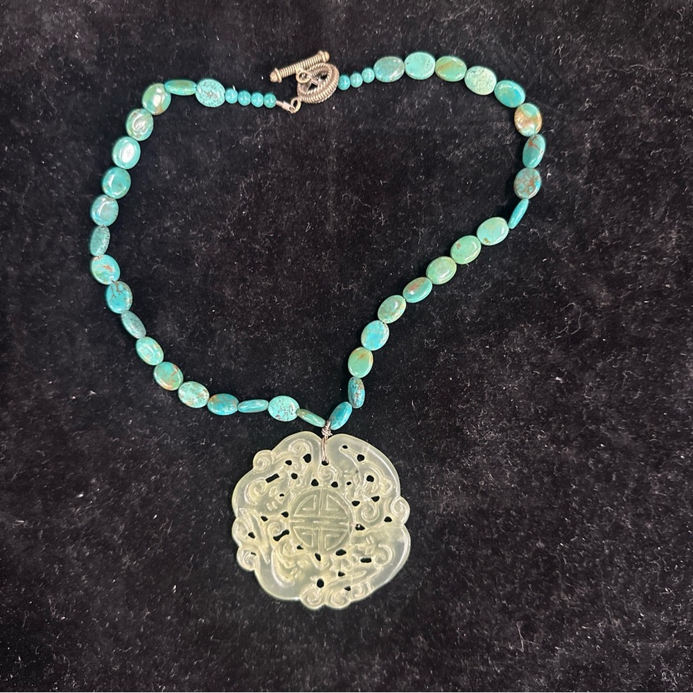 carved jade 2” pendant with turquoise beads 15” necklace.